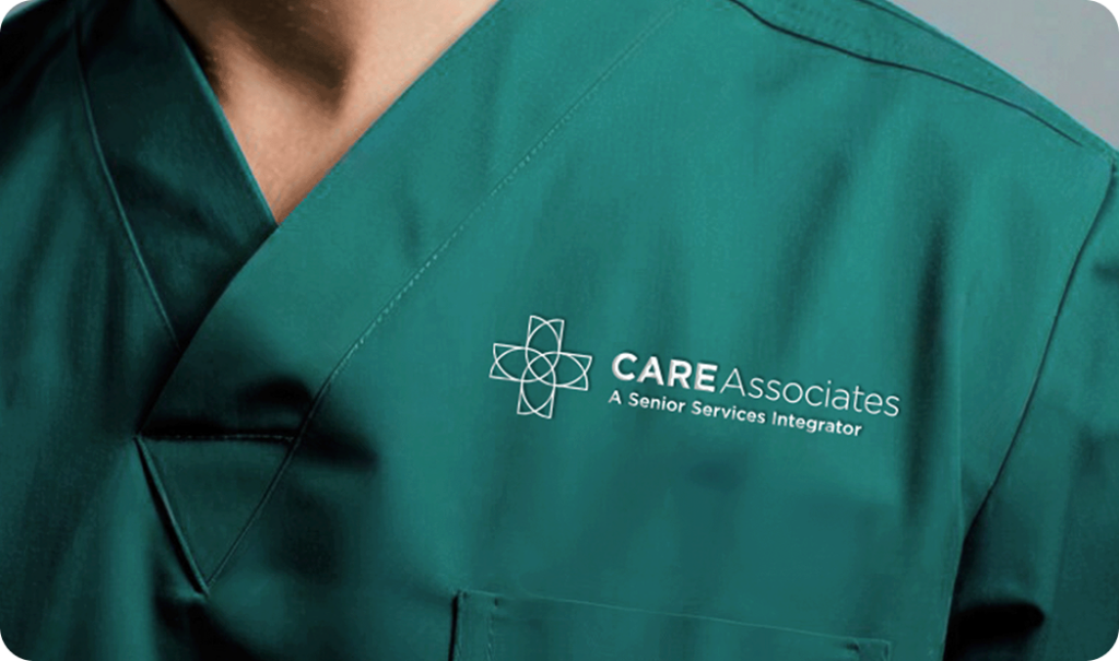 Care Associates logo embroidered on branded apparel