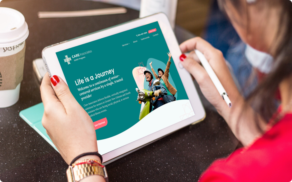 Person viewing the Care Associates website on a tablet